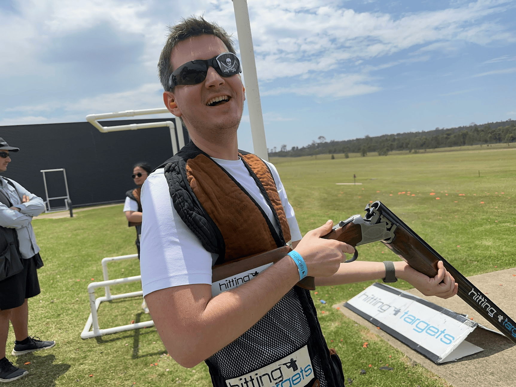 Sentia team member clay target shooting at a team event