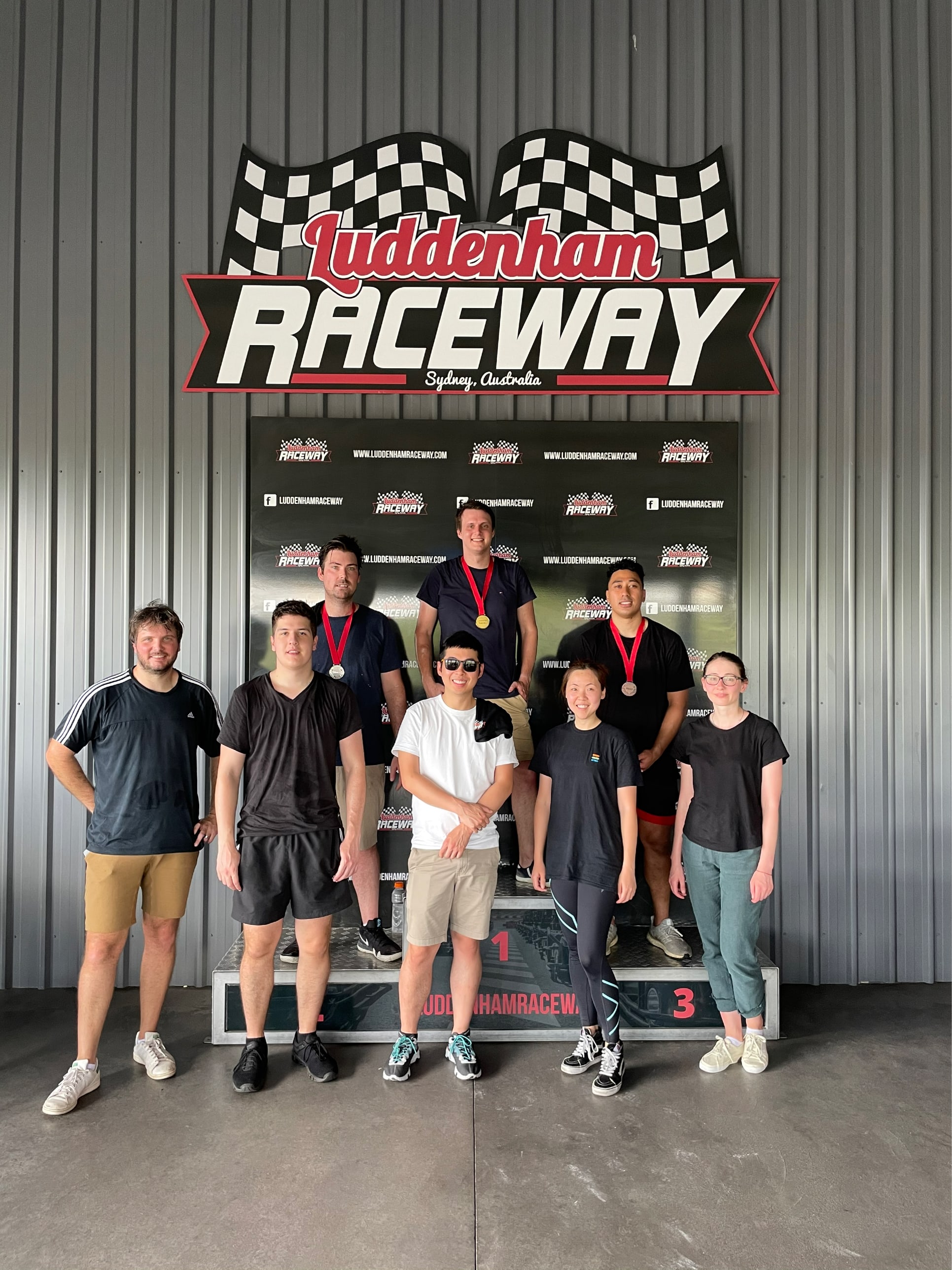 Sentia team on the podium at a go-karting team event