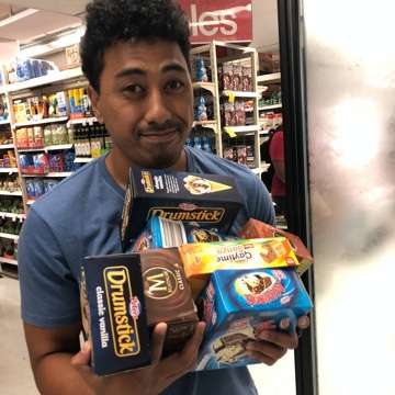 Sentia team member with a stack of ice creams